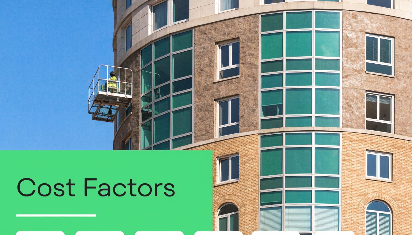 A professional window cleaner works on an elevated platform on the exterior of a curved building.